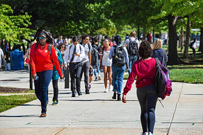 University of Maryland, College Park students are seen walking outside on the College Park campus.